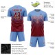 Benutzerdefiniertes hellblaues purpurrotes und cremefarbenes Sublimations-Fußballtrikot
